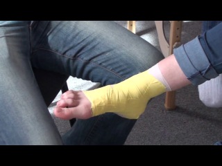 sport taping. foot bandage. sport physio therapy and rehabilitation.